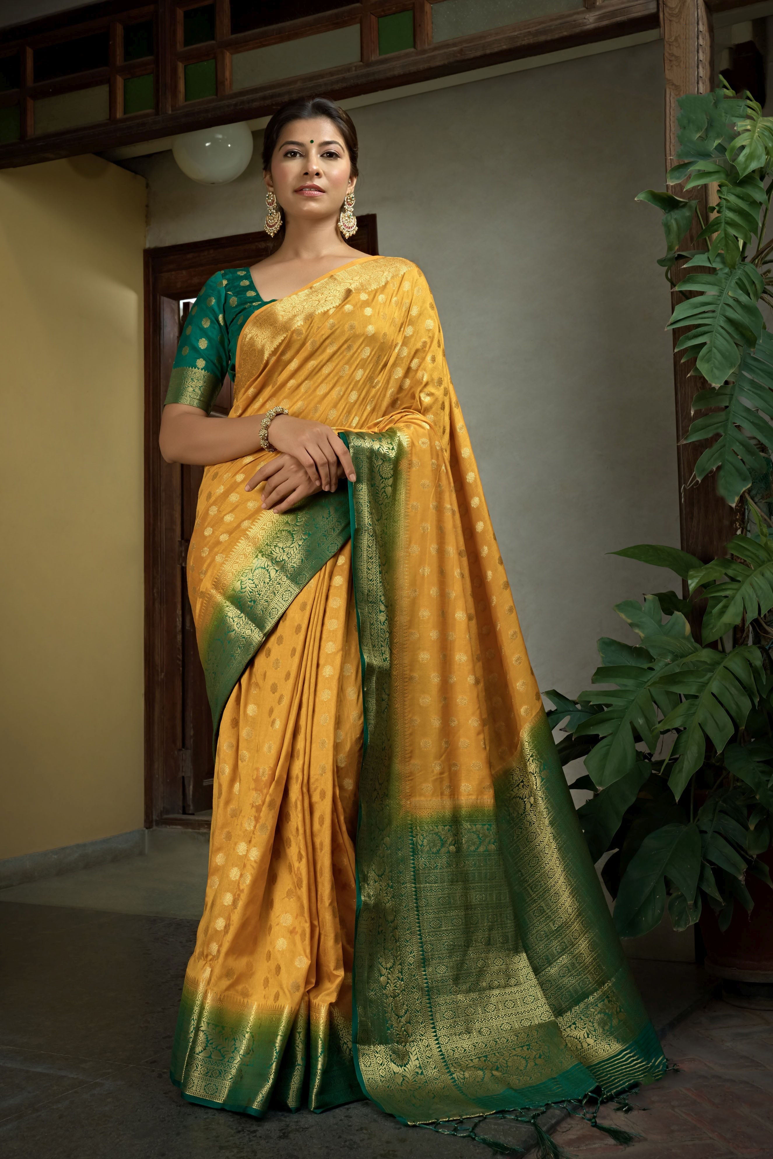 Mustard Dola Silk Saree with Green Blouse & Zari Weaving Work