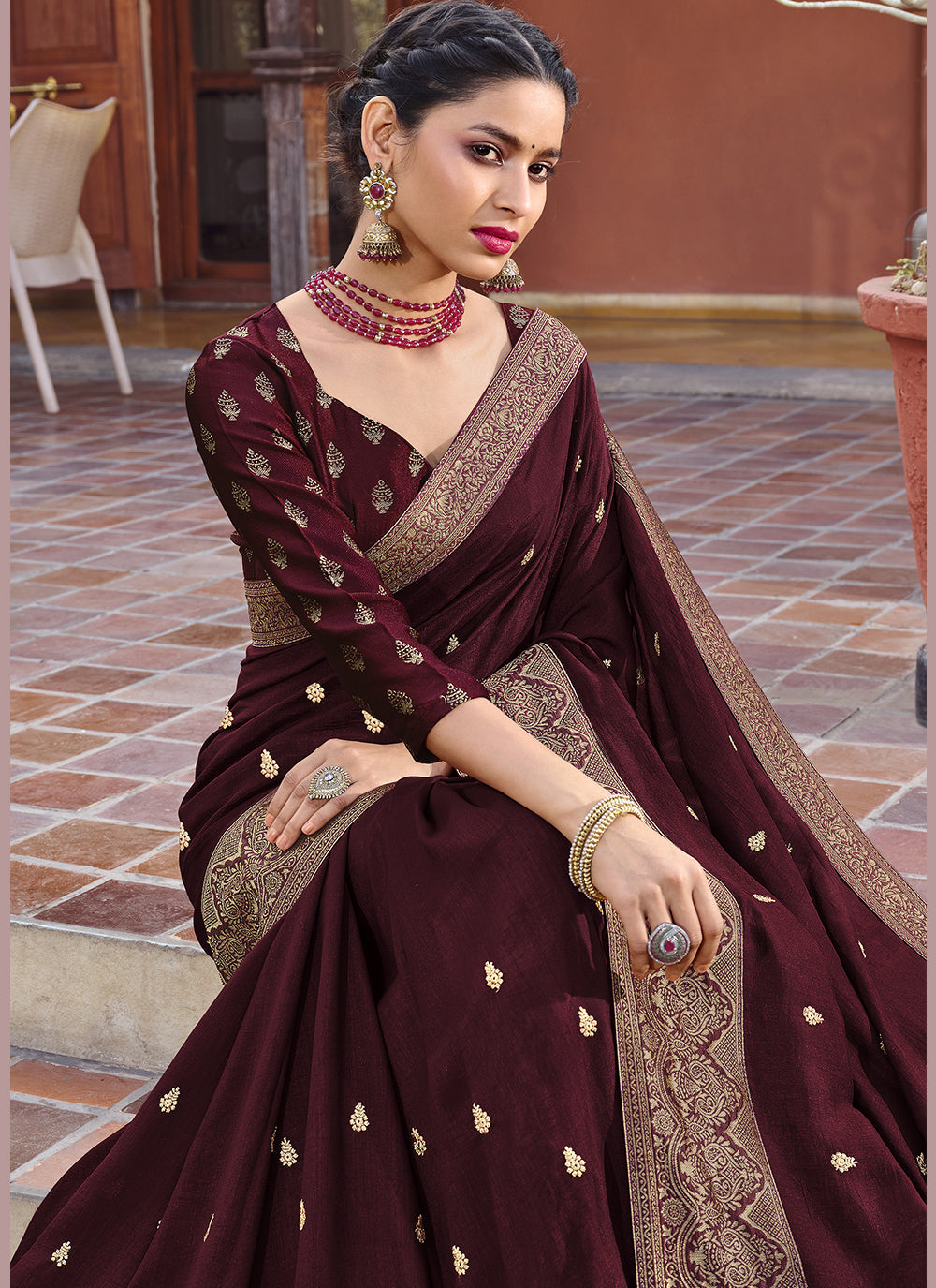 Burgundy Silk Blend Saree with Intricate Embroidery and Wevon Border Blouse