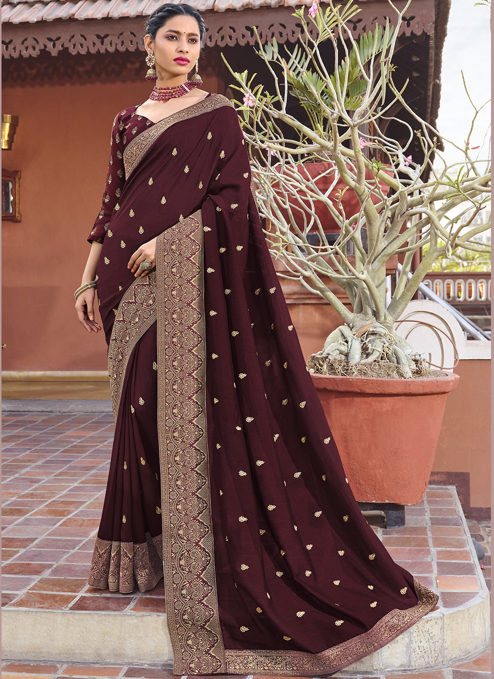Burgundy Silk Blend Saree with Intricate Embroidery and Wevon Border Blouse