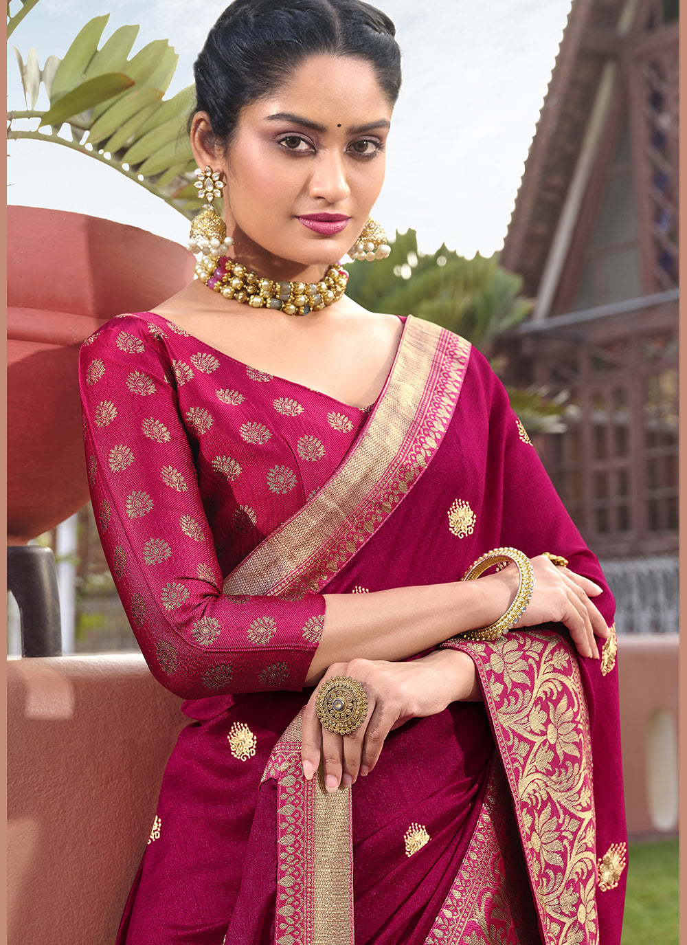 Pink Silk Blend Saree with Golden Embroidery and Wevon Border Blouse